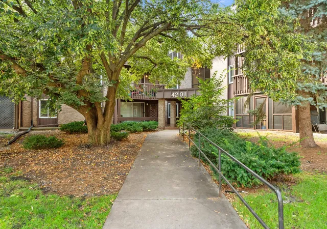 Listing Photo 5 - Condo for sale in building located at 4201 Lakeside Ave N, Brooklyn Center, MN 55429 - Unit #113