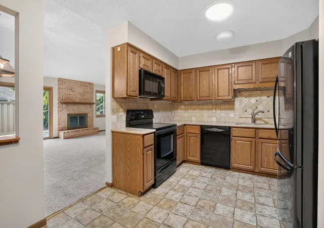 Photo 4 of Single family home for sale at 7055 Robinwood Trl, Saint Paul, MN 55125 | MLS# 7129179 | Listing updated on 2026-09-08