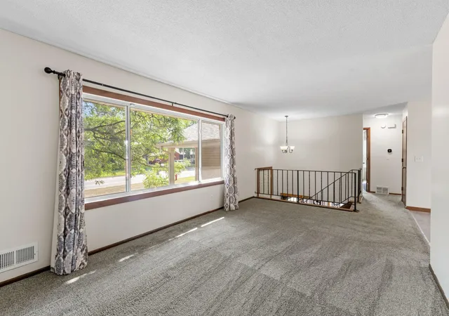Photo 4 of Single family home for sale at 11833 Kentucky Ave N, Champlin, MN 55316 | MLS# 7137083 | Listing updated on 2026-09-15