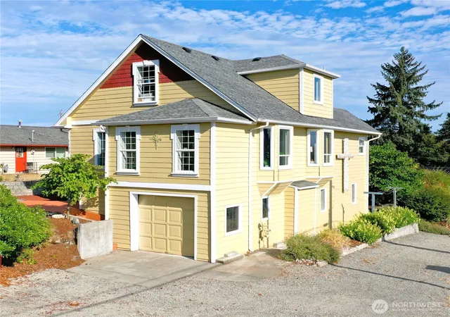 Photo 2 of Multi family home for sale at 1109 E 31st Street, Tacoma, WA 98404 | MLS# NWM2512006 | Listing updated on 2026-09-21