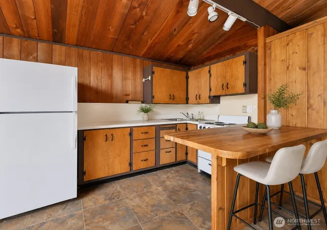 Photo 3 of Single family home for sale at 819 E Madrona Blvd NW, Lakebay, WA 98349 | MLS# NWM2533508 | Listing updated on 2026-09-21