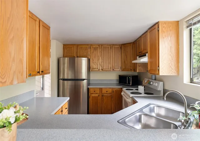 Photo 4 of Sale Pending at 15123 Sunwood Blvd #GG21, Tukwila, WA 98188 | MLS# NWM2542829 | Listing updated on 2026-09-24