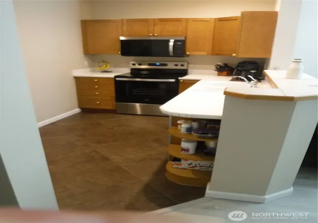 Photo 3 of Townhouse for sale at 12712 Admiralty Way SE #D303, Everett, WA 98204 | MLS# NWM2548927 | Listing updated on 2026-09-23