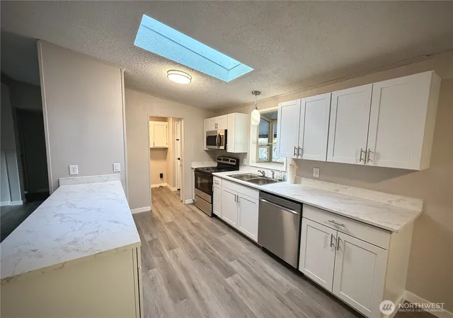 Photo 3 of Manufactured home for sale at 11417 124th Street Ct E #116, Puyallup, WA 98374 | MLS# NWM2559509 | Listing updated on 2026-09-25