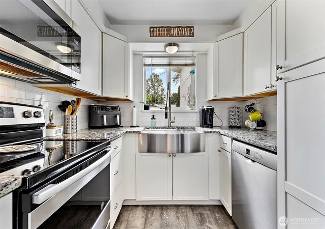 Photo 3 of Single family home for sale at 7402 E F St, Tacoma, WA 98404 | MLS# NWM2560521 | Listing updated on 2026-09-30