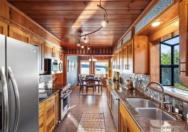 Photo 3 of Sale Pending at 4420 Sunset Beach Rd W, Tacoma, WA 98466 | MLS# NWM2565100 | Listing updated on 2026-09-25