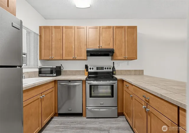 Photo 3 of Condo for sale at 14445 Ne 40th Street #D101, Bellevue, WA 98007 | MLS# NWM2576067 | Listing updated on 2026-09-25