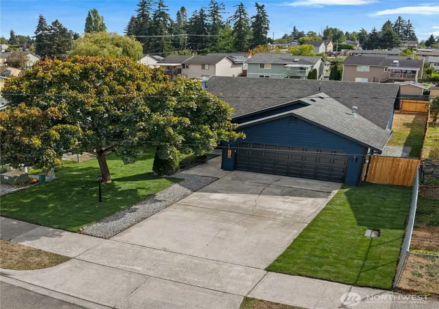 Photo 2 of Single family home for sale at 1418 E 59th Street, Tacoma, WA 98404 | MLS# NWM2576853 | Listing updated on 2026-09-22
