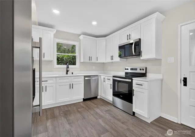 Photo 4 of Single family home for sale at 1412 N Steele St, Tacoma, WA 98406 | MLS# NWM2578510 | Listing updated on 2026-09-25
