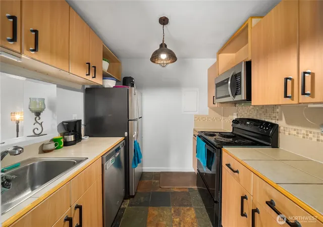 Photo 3 of Condo for sale at 32304 4th Place S #R1, Federal Way, WA 98003 | MLS# NWM2579313 | Listing updated on 2026-09-25