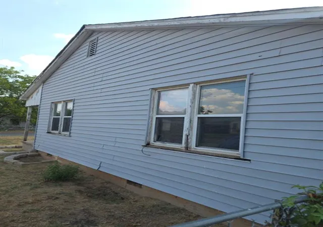 Photo 3 of Single family home for sale at 215 E Spruce Ave, Duncan, OK 73533 | MLS# 1248263 | Listing updated on 2026-10-04