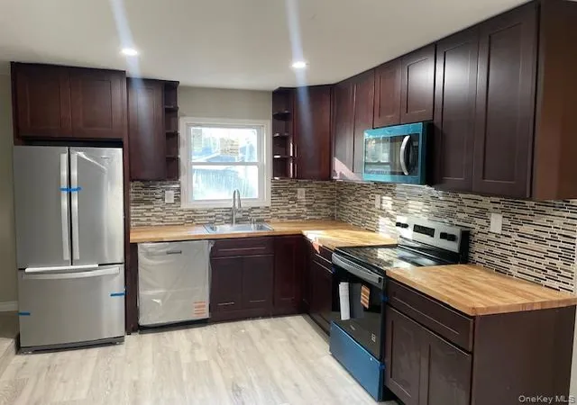 Photo 2 of Single family home for sale at 56 Ash St, Islip, NY 11722 | MLS# 918745 | Listing updated on 2026-09-12