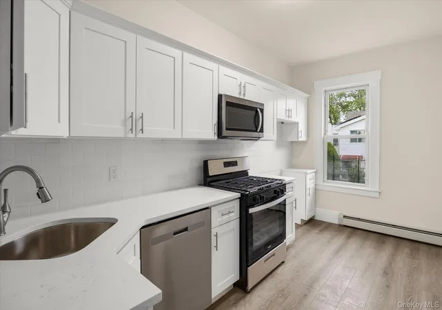 Photo 3 of Multi family home for sale at 9547 115th Street, South Richmond Hill, NY 11419 | MLS# 1001149 | Listing updated on 2026-09-30