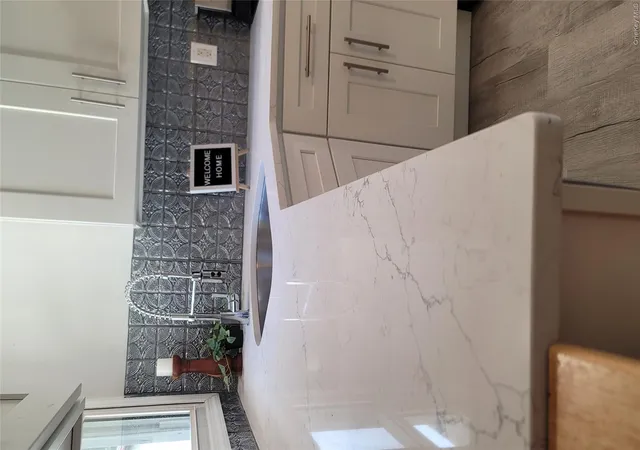 Photo 3 of Single family home for sale at 131 Village Cir W, Brookhaven, NY 11949 | MLS# 1001366 | Listing updated on 2026-09-13