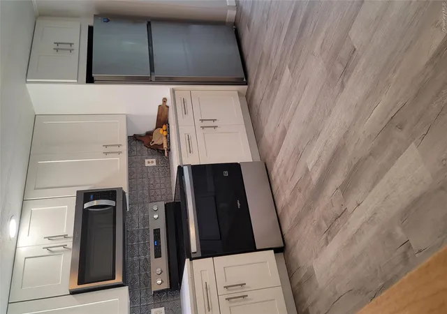 Photo 4 of Single family home for sale at 131 Village Cir W, Brookhaven, NY 11949 | MLS# 1001366 | Listing updated on 2026-09-13