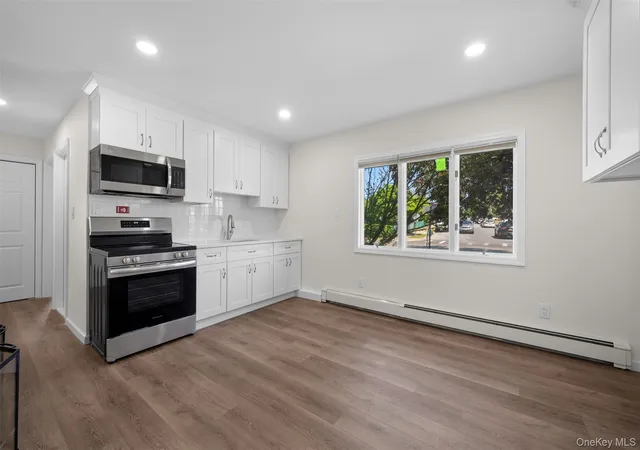 Photo 3 of Single family home for sale at 22 Lowland Rd, Hempstead, NY 11756 | MLS# 1004574 | Listing updated on 2026-09-15