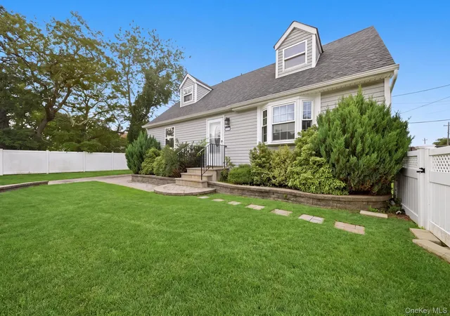 Photo 2 of Single family home for sale at 85 Schleigel Blvd, Oyster Bay, NY 11735 | MLS# 1024776 | Listing updated on 2026-09-10