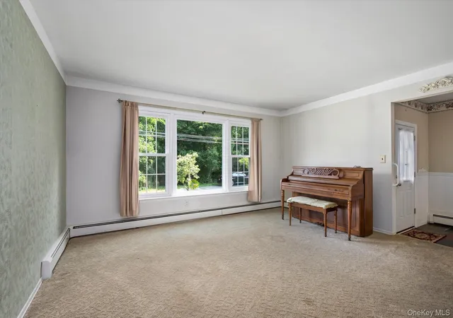 Photo 3 of Single family home for sale at 21 Vause St, Huntington, NY 11768 | MLS# 1027110 | Listing updated on 2026-09-30