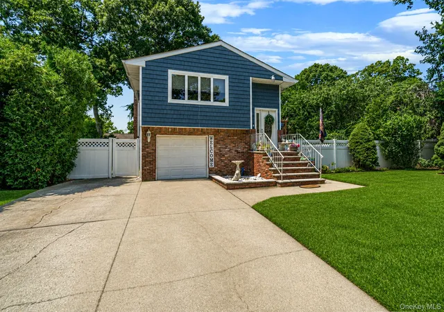 Photo 3 of Single family home for sale at 12 Fannie Dr, Brookhaven, NY 11738 | MLS# 1030936 | Listing updated on 2026-09-12