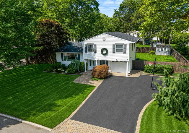 Photo 1 of Single family home for sale at 49 Munson Ct, Huntington, NY 11747 | MLS# 1030949 | Listing updated on 2026-09-15
