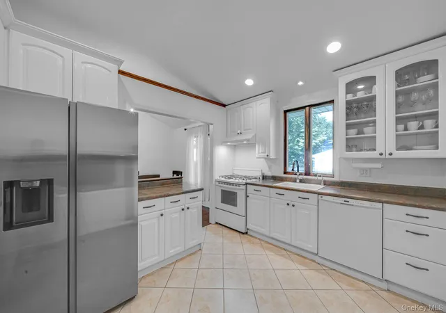 Photo 3 of Single family home for sale at 49 Munson Ct, Huntington, NY 11747 | MLS# 1030949 | Listing updated on 2026-09-15