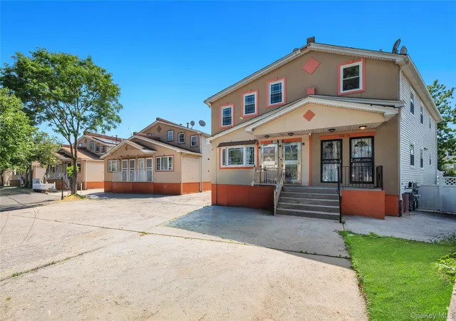 Photo 2 of Multi family home for sale at 14014 Charles Ln, New York, NY 11413 | MLS# 1032283 | Listing updated on 2026-09-14