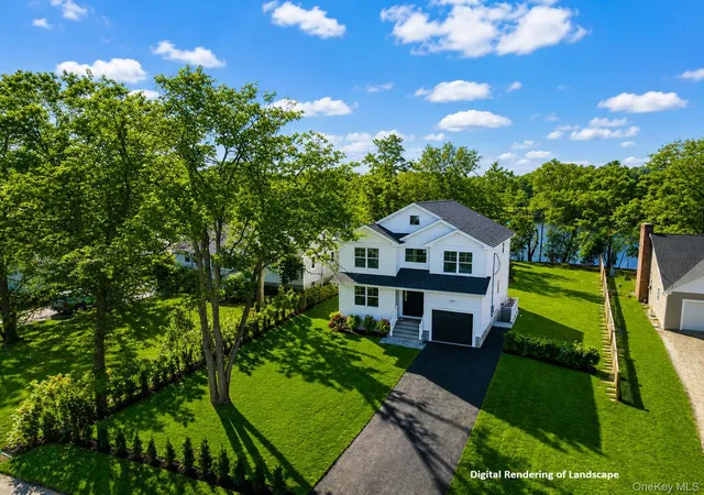 Photo 2 of Single family home for sale at 909 Ostrander Ave, Riverhead, NY 11901 | MLS# 1032681 | Listing updated on 2026-09-13