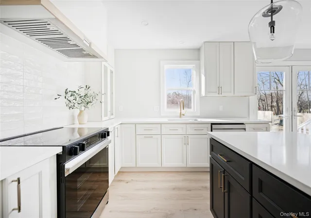 Photo 4 of Single family home for sale at 909 Ostrander Ave, Riverhead, NY 11901 | MLS# 1032681 | Listing updated on 2026-09-13