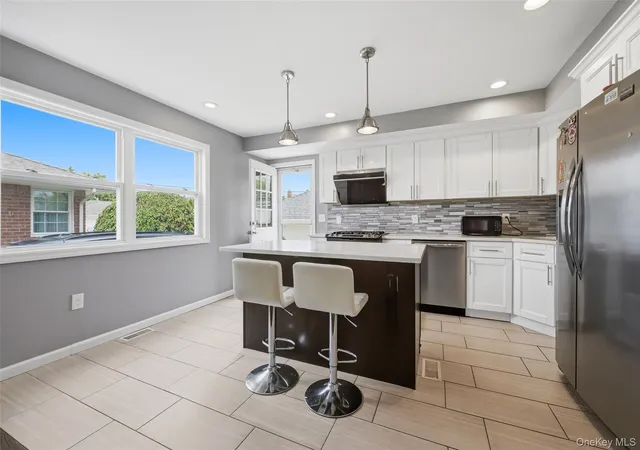 Photo 3 of Single family home for sale at 105 Wadsworth Ave, Hempstead, NY 11756 | MLS# 1033668 | Listing updated on 2026-09-14