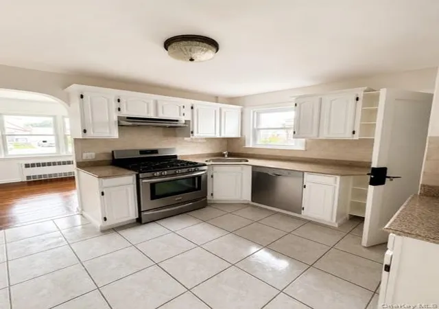 Photo 3 of Single family home for sale at 12031 219th Street, New York, NY 11411 | MLS# 1034340 | Listing updated on 2026-09-13