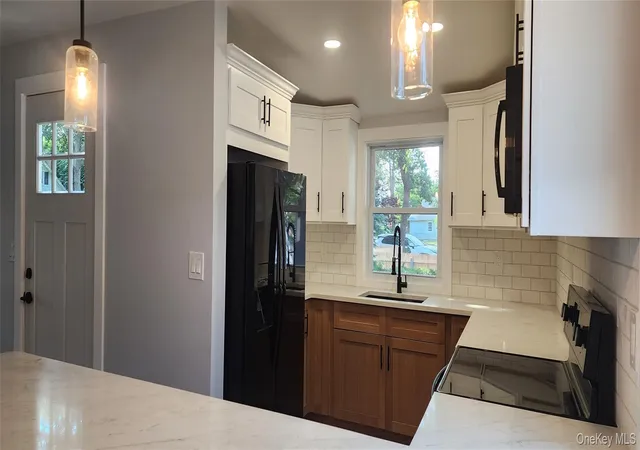 Photo 2 of Single family home for sale at 68 Montauk Dr, Brookhaven, NY 11951 | MLS# 1036191 | Listing updated on 2026-09-12