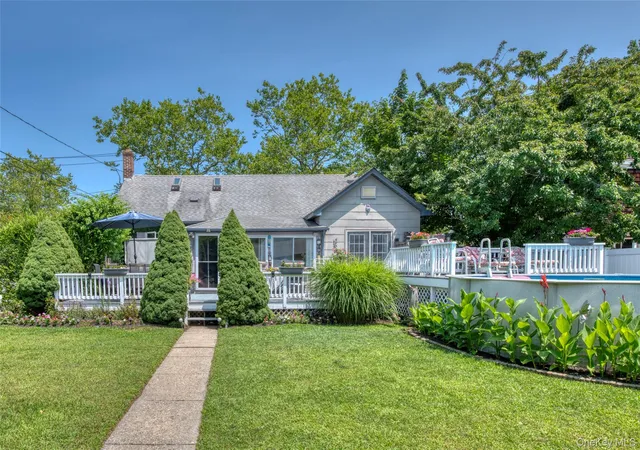 Photo 2 of Single family home for sale at 1227 Roanoke Ave, Riverhead, NY 11901 | MLS# 1036477 | Listing updated on 2026-09-19