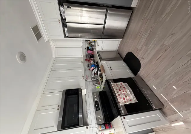 Photo 4 of Single family home for sale at 69 Mastic Blvd, Brookhaven, NY 11950 | MLS# 1037619 | Listing updated on 2026-09-12