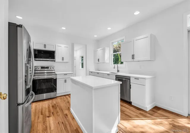 Photo 4 of Single family home for sale at 1871 Edwards Ave, Riverhead, NY 11933 | MLS# 1037778 | Listing updated on 2026-09-26