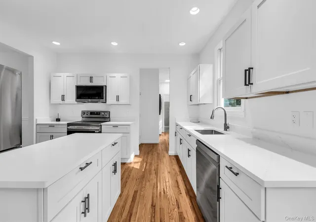 Photo 3 of Single family home for sale at 1871 Edwards Ave, Riverhead, NY 11933 | MLS# 1037778 | Listing updated on 2026-09-26