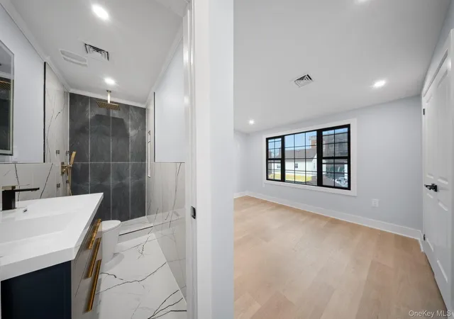 Photo 3 of Single family home for sale at 11593 217th Street, New York, NY 11411 | MLS# 1039929 | Listing updated on 2026-09-14