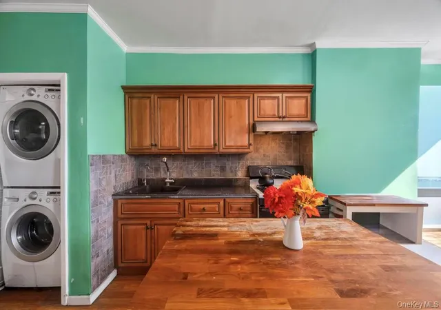 Photo 4 of House for sale at 6144 Eliot Ave, New York, NY 11379 | MLS# 1041311 | Listing updated on 2026-09-24