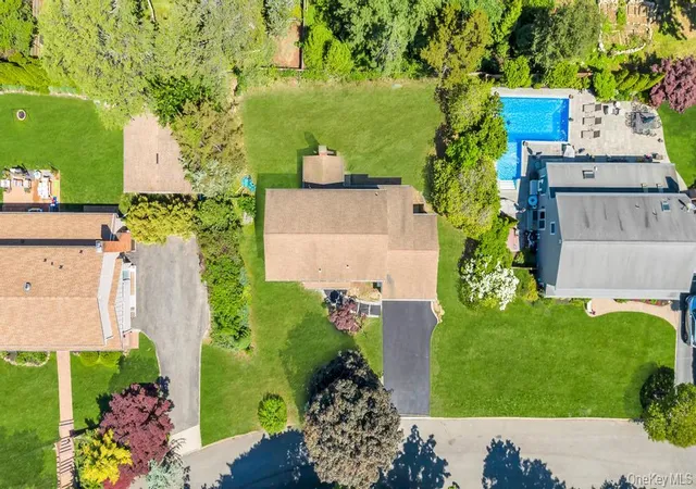Photo 2 of Single family home for sale at 8 Cynthia Ln, Huntington, NY 11768 | MLS# 1041686 | Listing updated on 2026-09-30