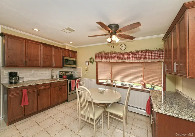 Photo 4 of Single family home for sale at 5 Woodcock Ln, Hempstead, NY 11756 | MLS# 1045472 | Listing updated on 2026-09-13