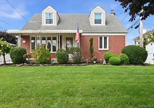 Single family home for sale at 303 Caroline Ave, Hempstead, NY 11530 | MLS# 1045629