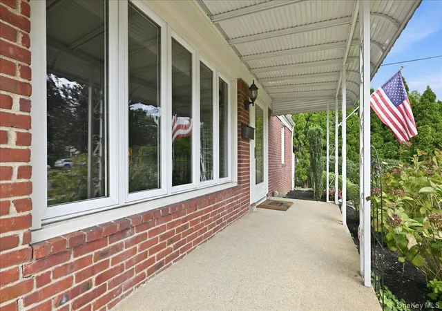 Photo 2 of Single family home for sale at 303 Caroline Ave, Hempstead, NY 11530 | MLS# 1045629 | Listing updated on 2026-09-14