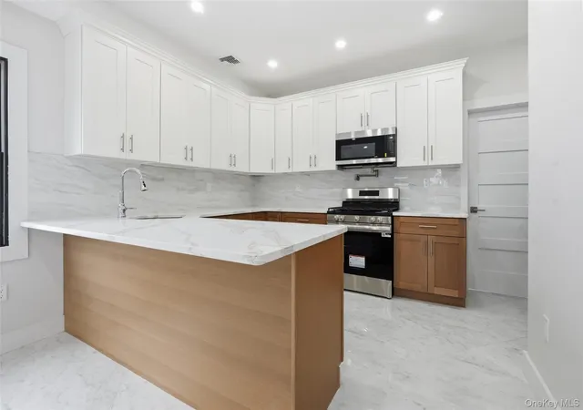 Listing Photo 5 - Condo for sale in building located at 23 Doherty Ave, Hempstead, NY 11003