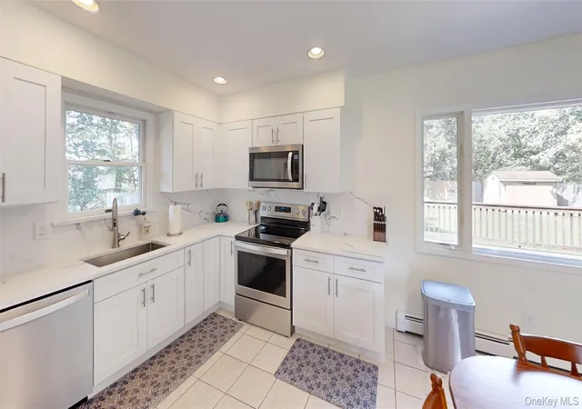 Photo 3 of Single family home for sale at 79 Yaphank Ave, Brookhaven, NY 11980 | MLS# 1046348 | Listing updated on 2026-09-13