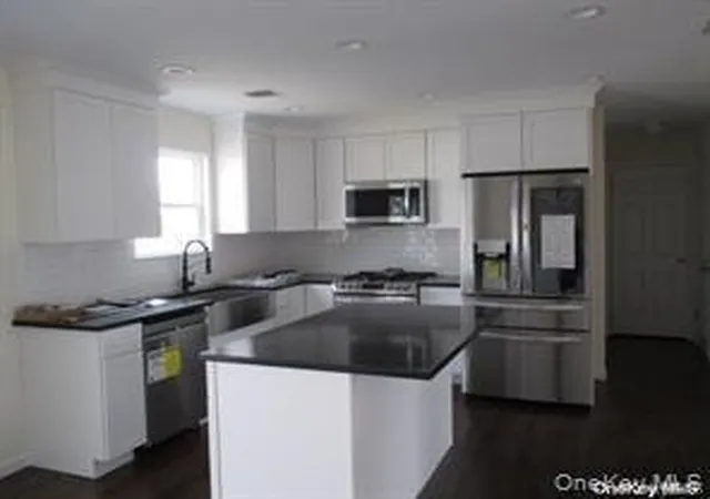 Photo 3 of Single family home for sale at 648 Bayview Ave, Brookhaven, NY 11713 | MLS# 1046738 | Listing updated on 2026-09-11