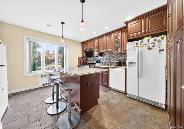 Photo 4 of Single family home for sale at 69 Stewart Ave, Hempstead, NY 11530 | MLS# 1048644 | Listing updated on 2026-09-15