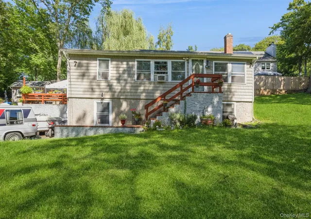Photo 2 of Single family home for sale at 25 Tamarack Rd, Brookhaven, NY 11778 | MLS# 1048793 | Listing updated on 2026-09-14