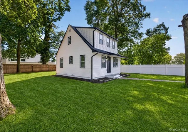 Photo 3 of Single family home for sale at 10 Harrison Dr, Brookhaven, NY 11967 | MLS# 1048953 | Listing updated on 2026-10-08