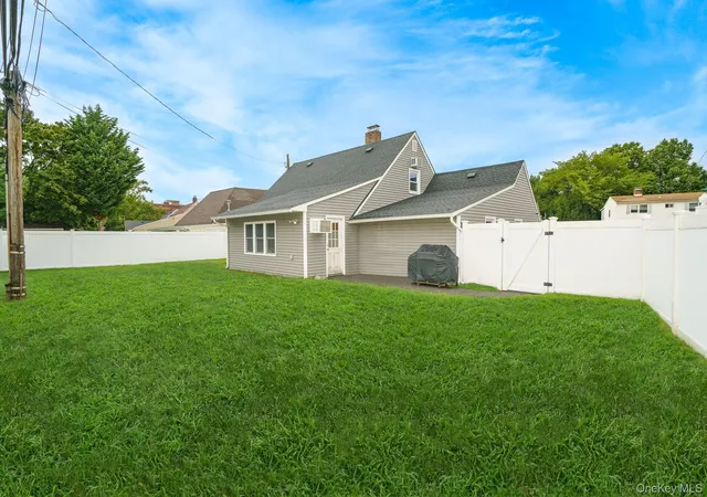 Photo 2 of Single family home for sale at 12 Squirrel Ln, Hempstead, NY 11756 | MLS# 1049029 | Listing updated on 2026-09-13