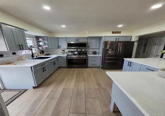 Photo 2 of Multi family home for sale at 95 07 87th Street, New York, NY 11416 | MLS# 1049069 | Listing updated on 2026-09-11