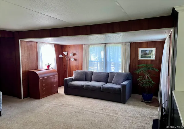 Photo 2 of Manufactured home for sale at 433 Mill Rd #91, Riverhead, NY 11933 | MLS# 1049944 | Listing updated on 2026-09-15